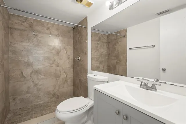 an empty room with a bathroom