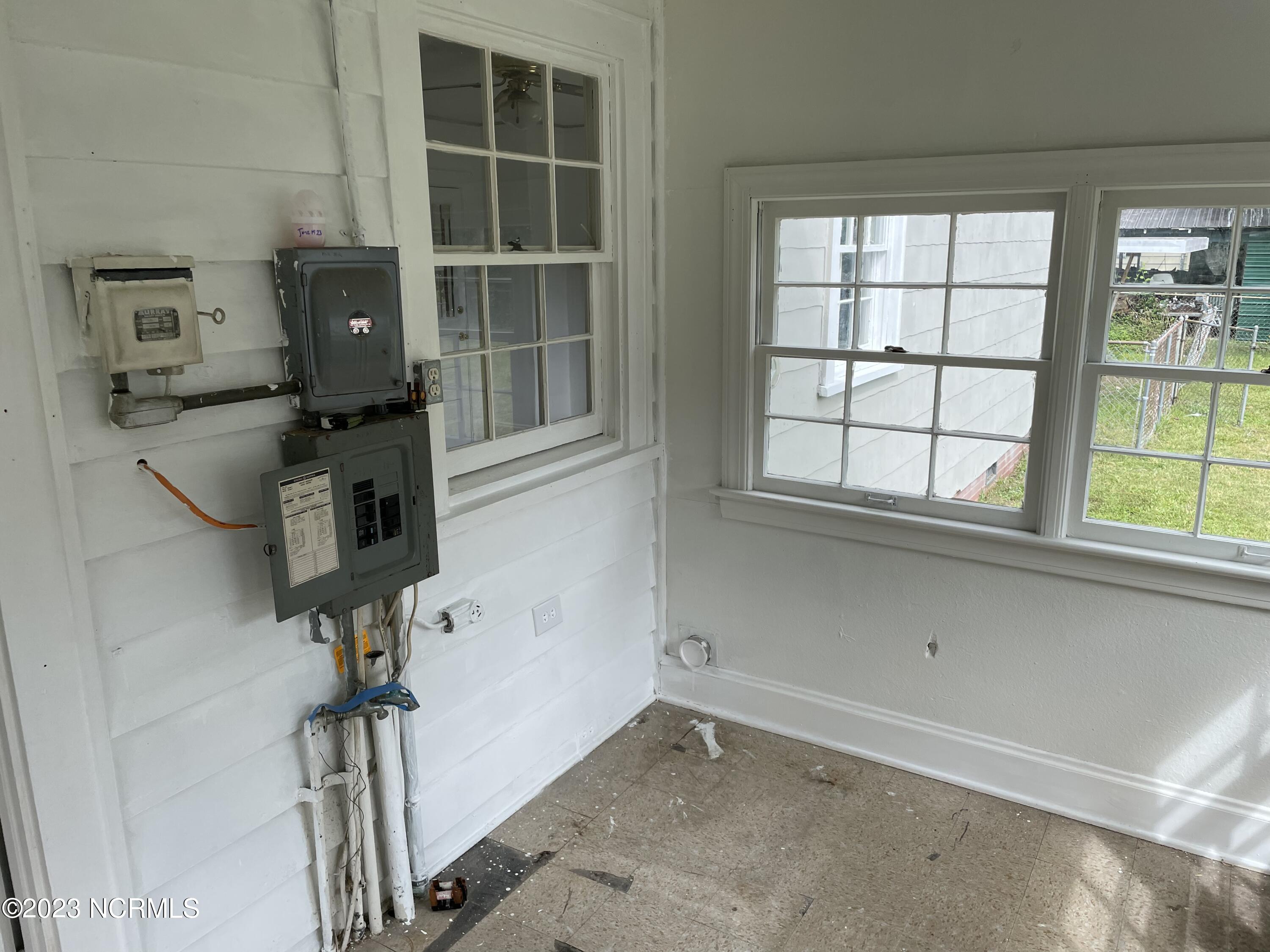 1241 Cokey Road Rocky Mount, NC 27801 - Photo 12 of 14 Enclosed back porch