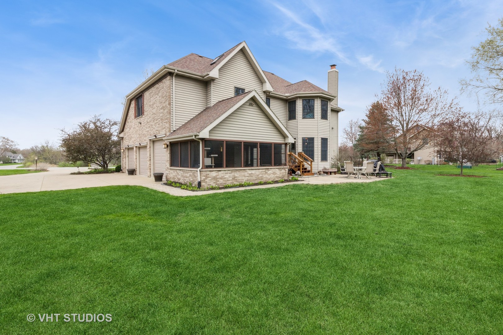 2760 East 1779th Road Ottawa, IL 61350 - Photo 5 of 29 a front view of a house with a yard and trees