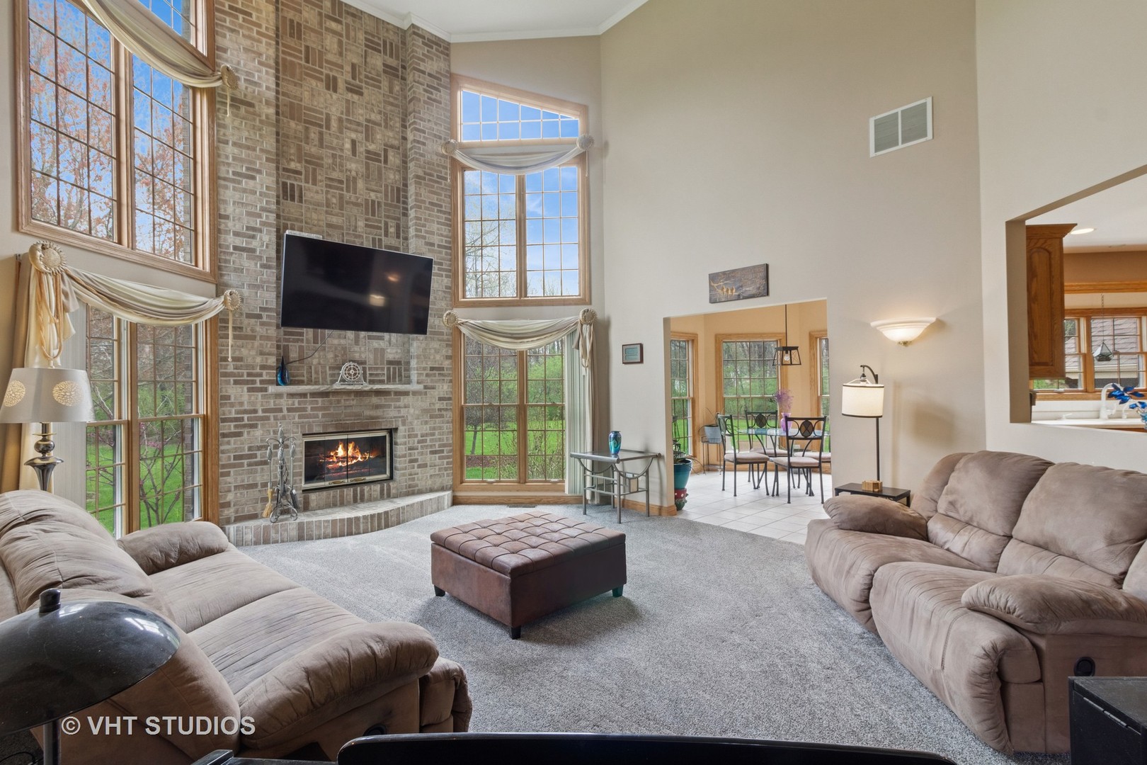 2760 East 1779th Road Ottawa, IL 61350 - Photo 9 of 29 a living room with furniture flat screen tv and a fireplace