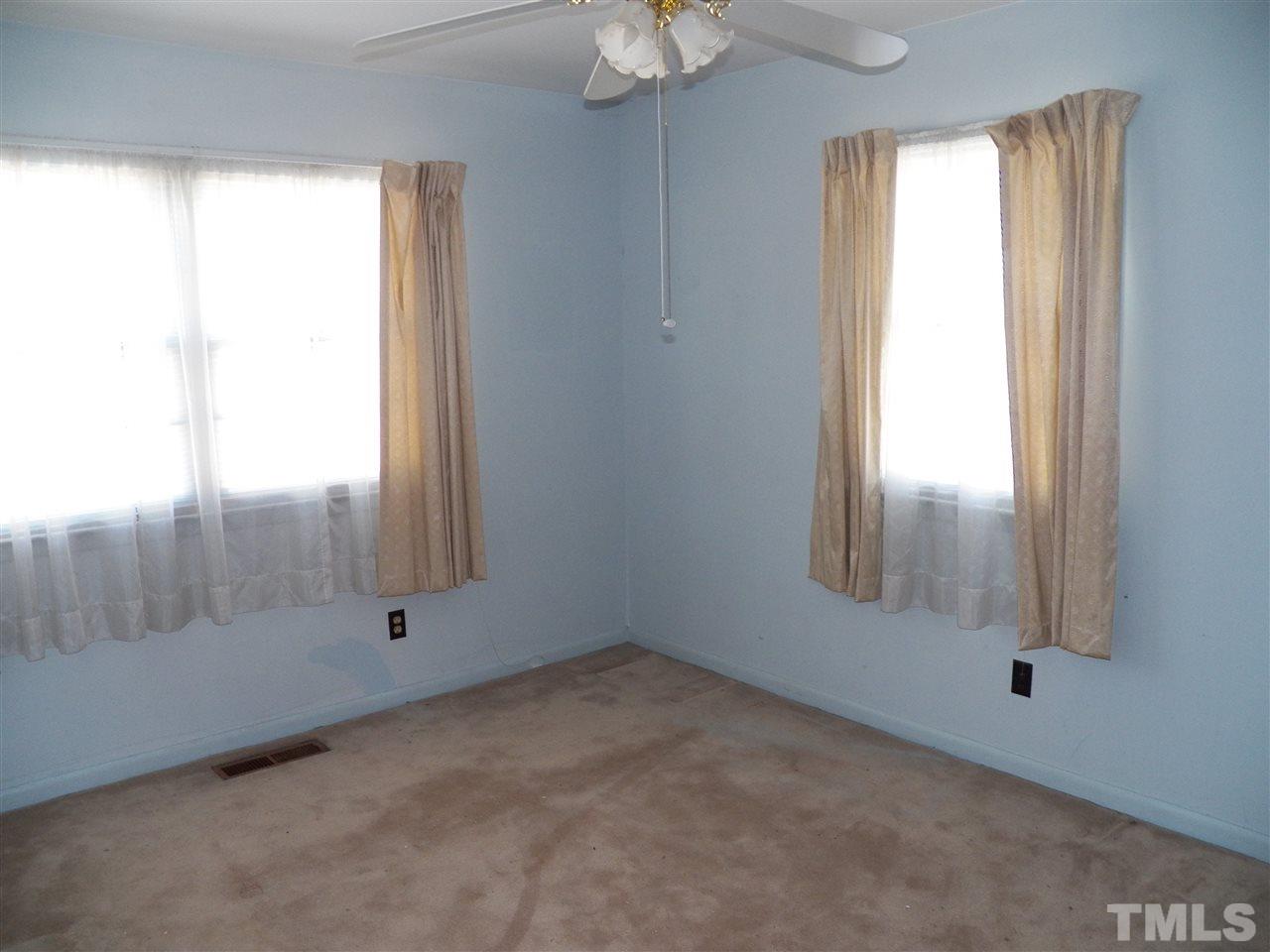 124 East Rowan Street Raleigh, NC 27609 - Photo 11 of 18 a view of an empty room with a window