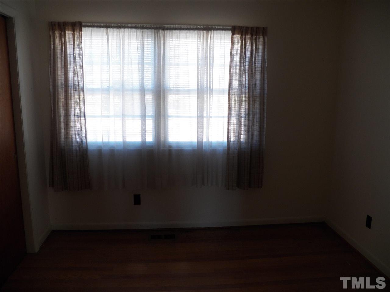 124 East Rowan Street Raleigh, NC 27609 - Photo 13 of 18 a view of wooden floor in an empty room