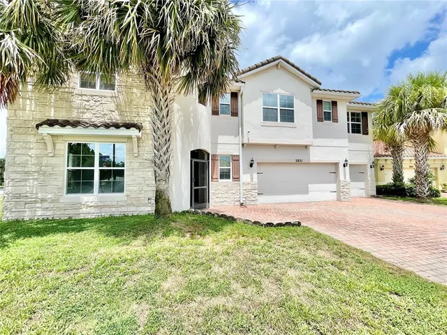 a view of a yard in front of a house