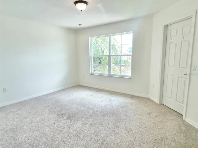a view of a storage and utility room in a utility room