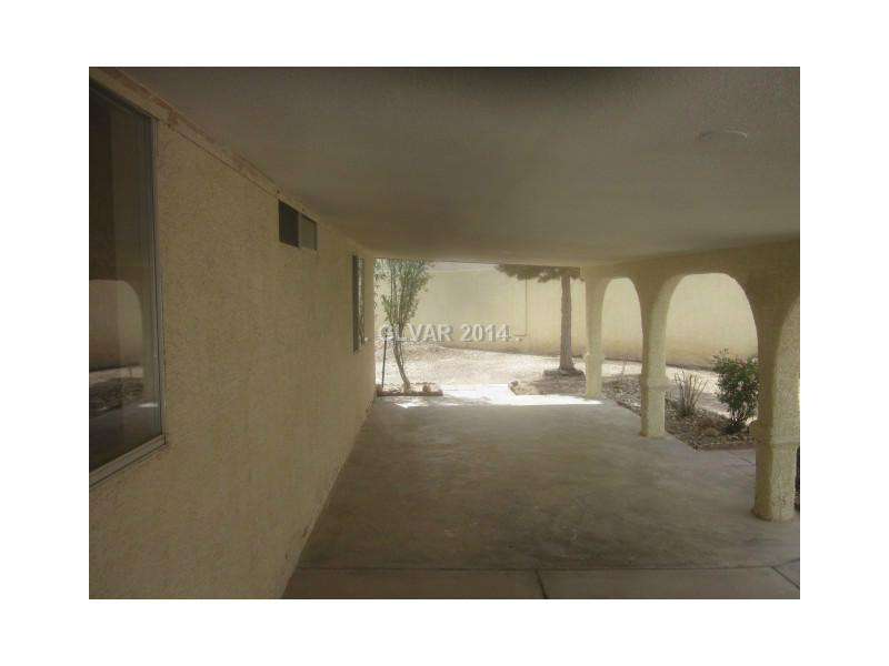 9593 Crystal Ridge Road Las Vegas, NV 89123 - Photo 9 of 11 Exterior Back. Full length covered patio