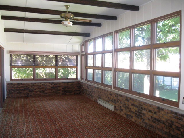 215 Linder Lane Rochelle, IL 61068 - Photo 3 of 19 a view of an empty room with a window