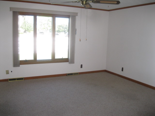 215 Linder Lane Rochelle, IL 61068 - Photo 5 of 19 a view of a room that has a window in it