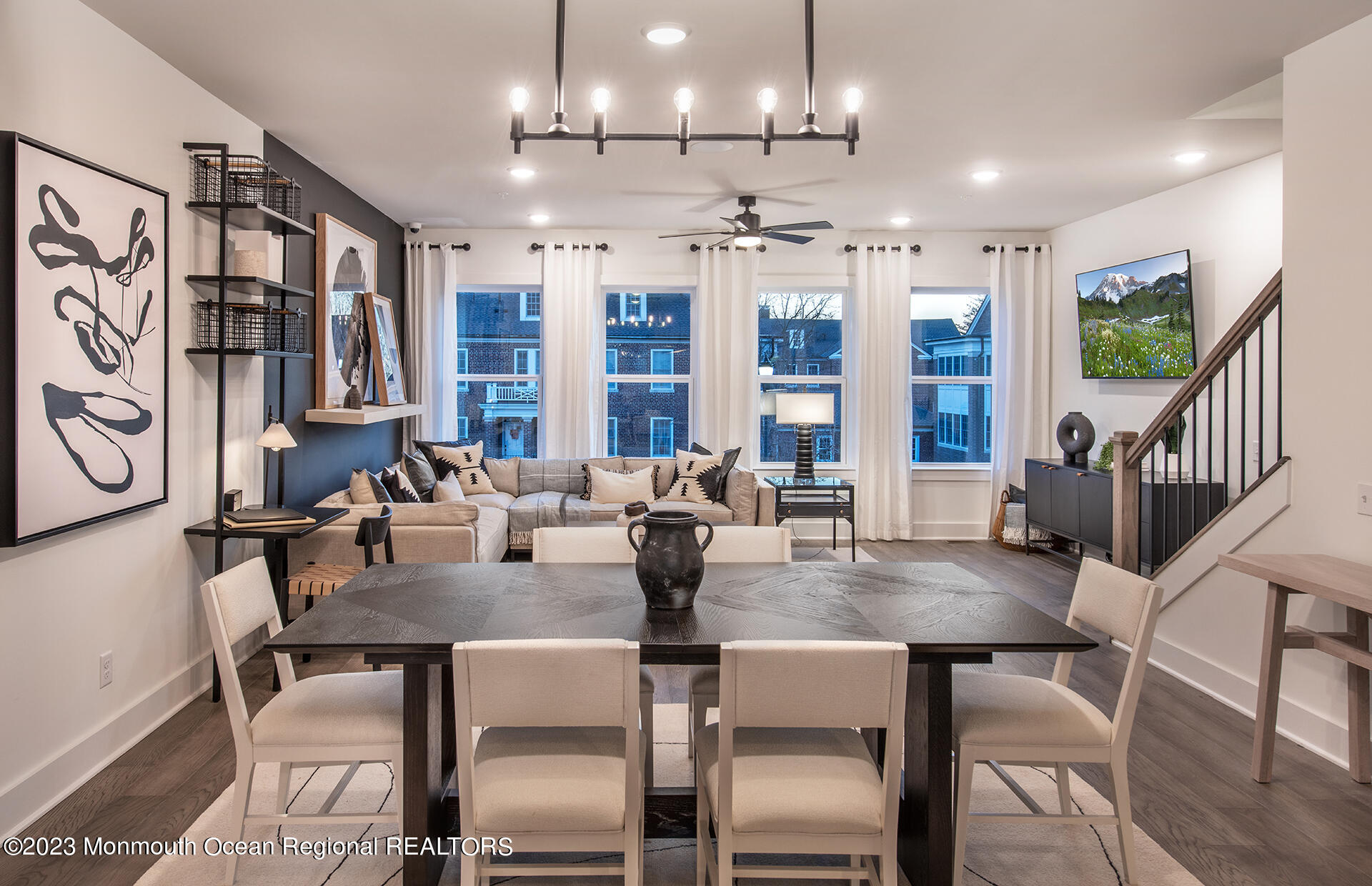 2 Sunset Oceanport, NJ 07757 - Photo 3 of 9 a view of a dining room with furniture a chandelier and wooden floor