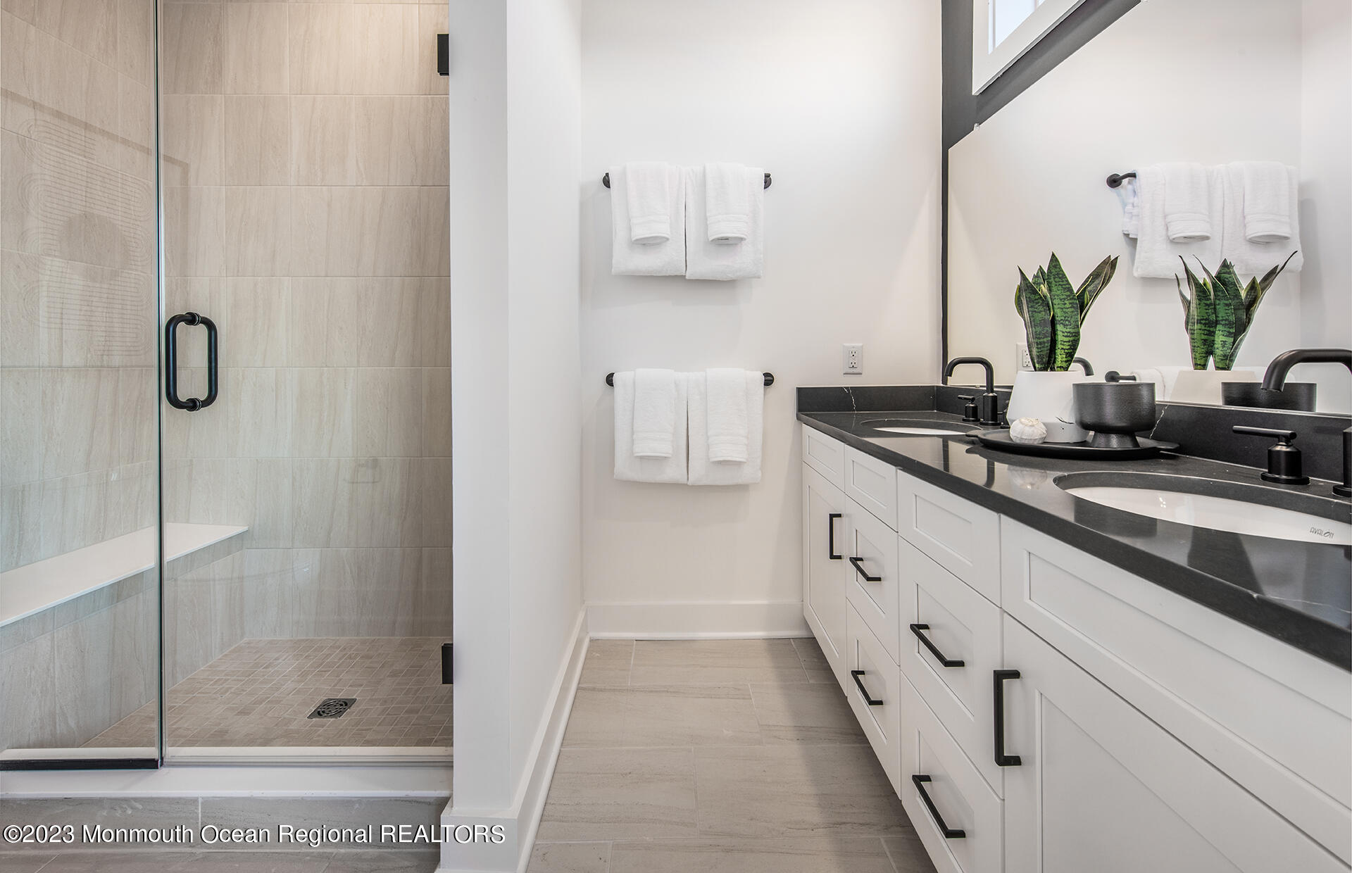 2 Sunset Oceanport, NJ 07757 - Photo 5 of 9 a bathroom with a granite countertop sink a mirror and shower