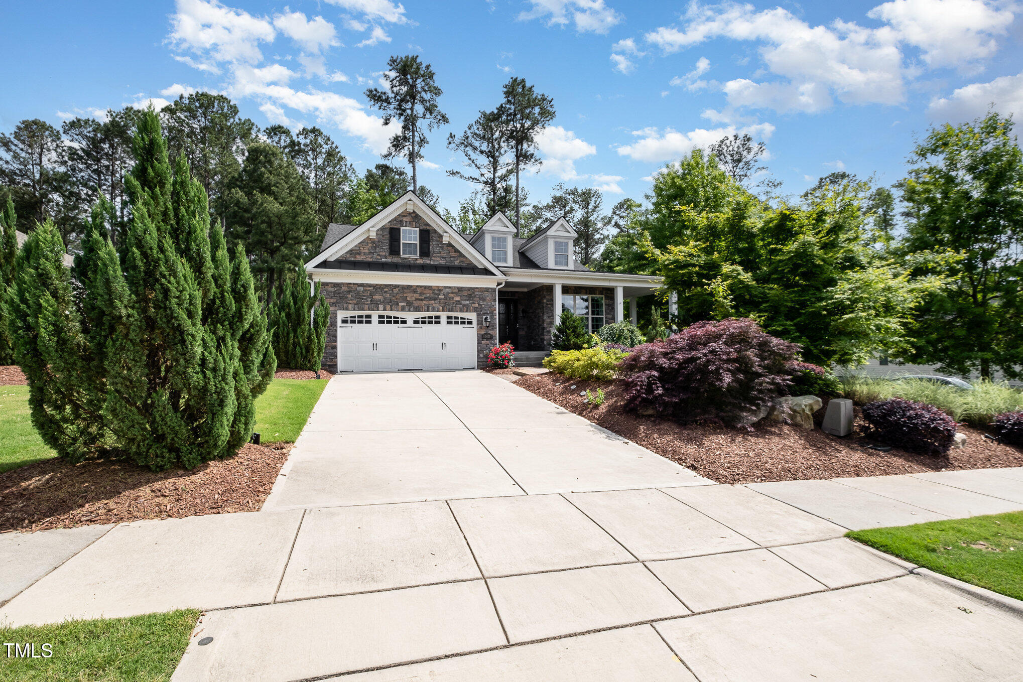 2421 Beckwith Road Apex, NC 27523 - Photo 5 of 45 Front facing garage and driveway