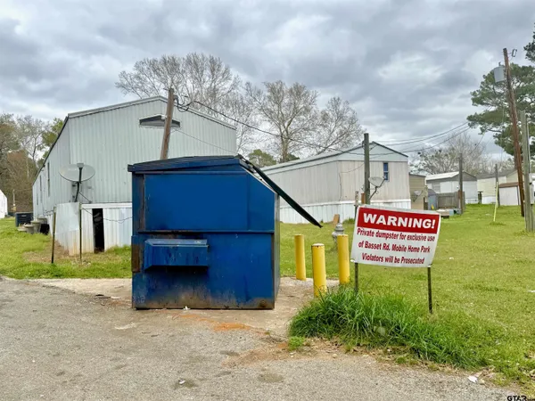 a sign on the side of the road