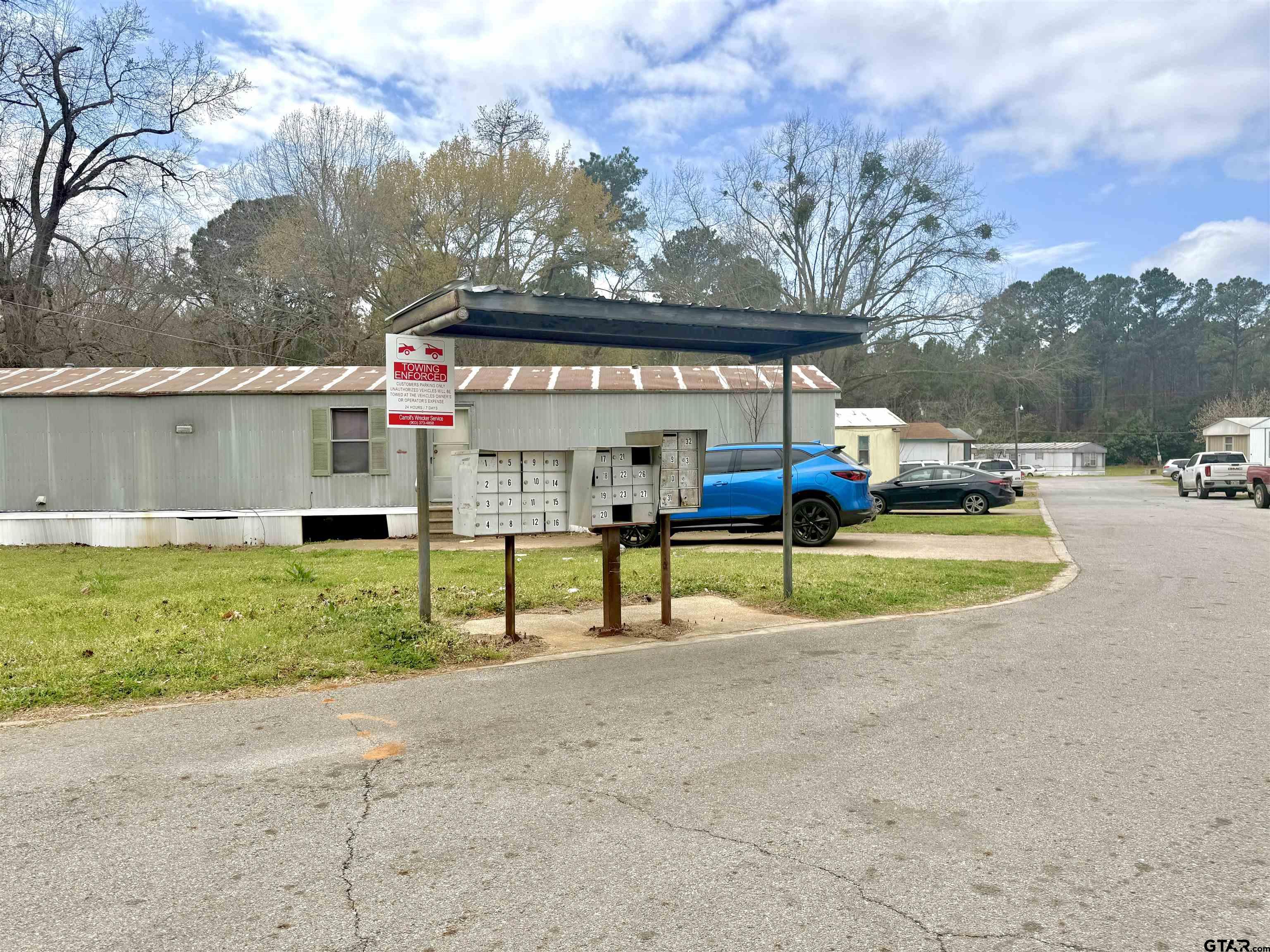 1111 Bassett Road Palestine, TX 75803 - Photo 7 of 8 a view of swimming pool with a yard and sitting area