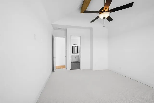 a spacious bathroom with a double vanity sink a mirror and shower