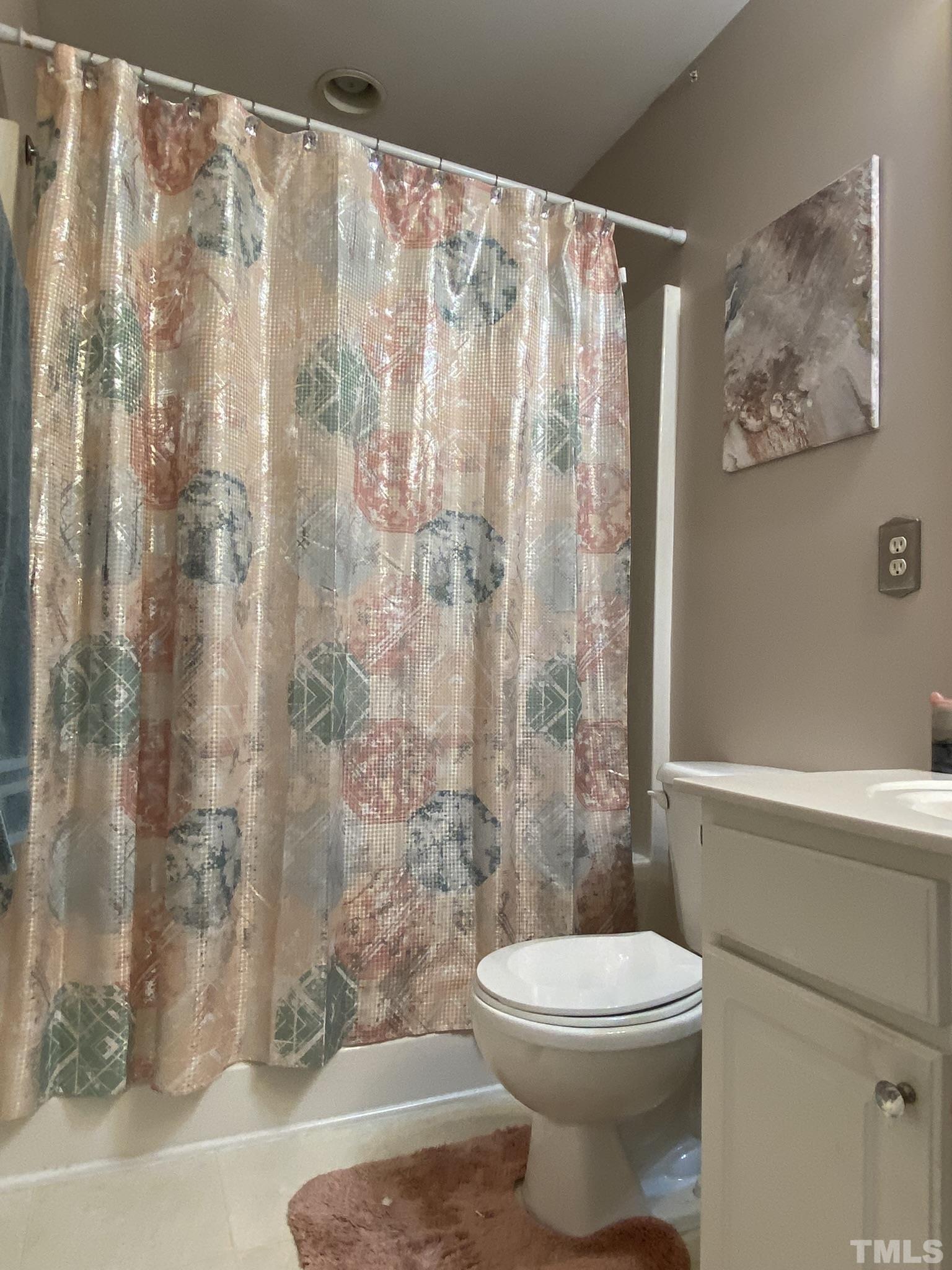 7251 Galon Glen Road Raleigh, NC 27613 - Photo 17 of 26 a bathroom with a toilet and shower