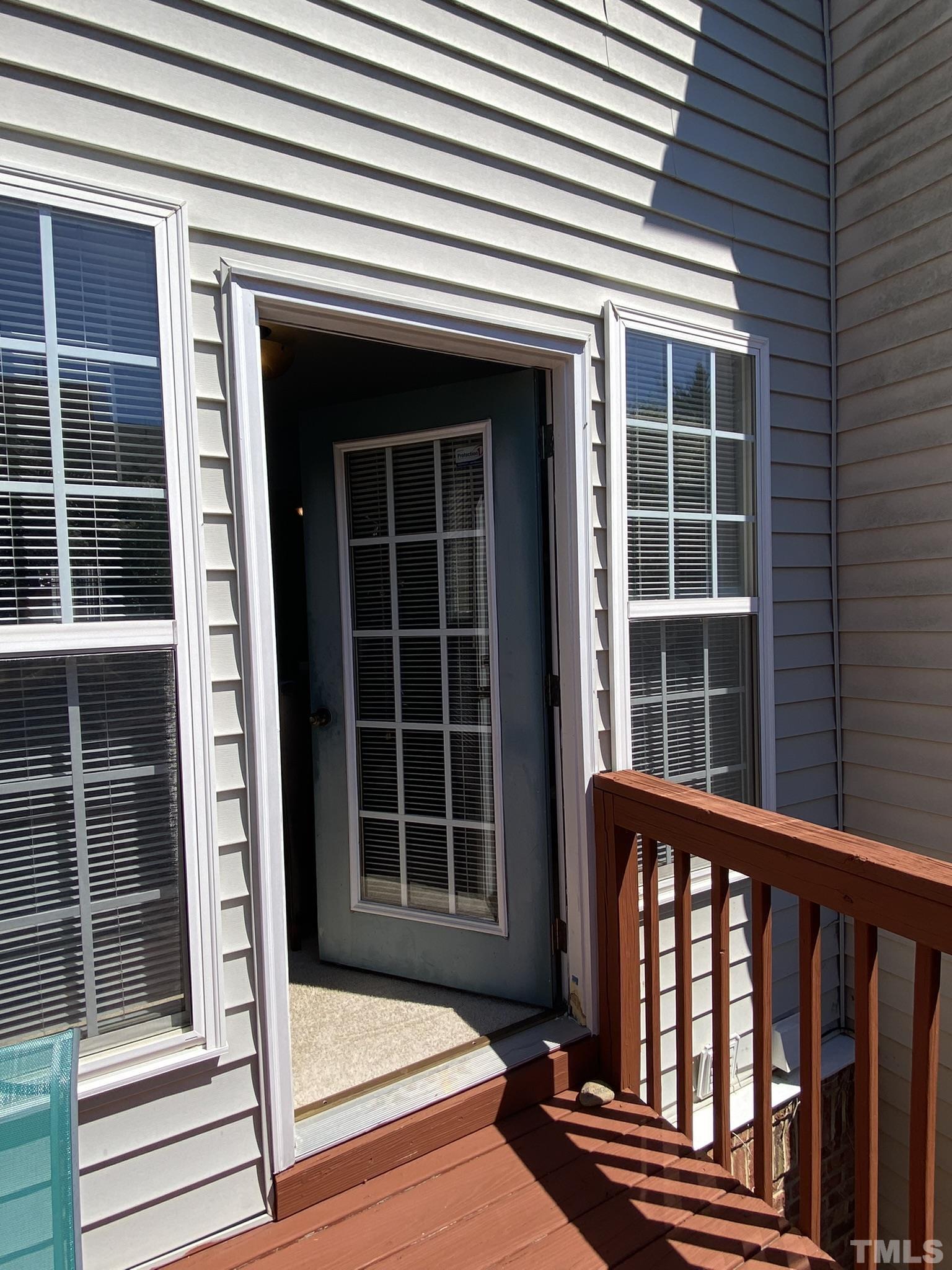 7251 Galon Glen Road Raleigh, NC 27613 - Photo 22 of 26 a view of front door and deck