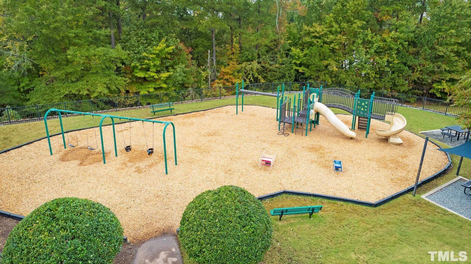 7251 Galon Glen Road Raleigh, NC 27613 - Photo 24 of 26 a view of a swimming pool with a patio
