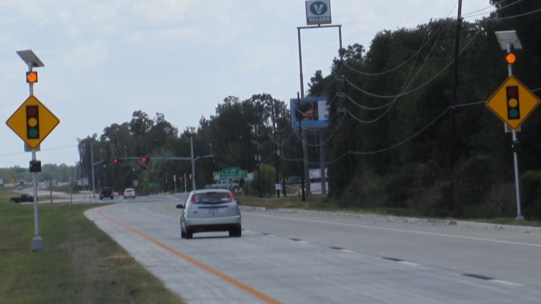 59 County Road 3708 Splendora, TX 77372 - Photo 1 of 1 a car parked on the side of the road