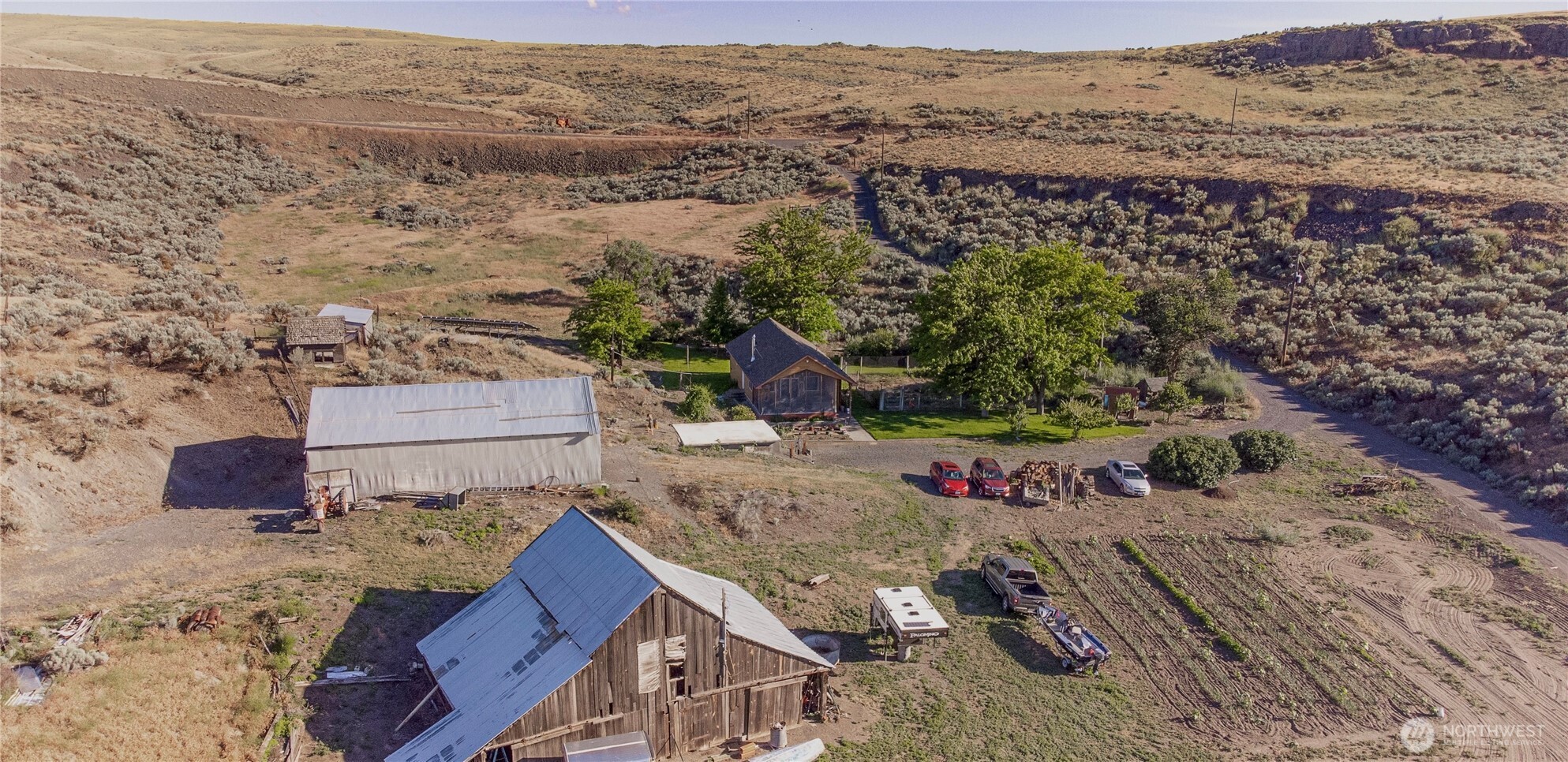 20548 Northeast 22nd Road Marlin, WA 98832 - Photo 2 of 26 an aerial view of a house with a yard