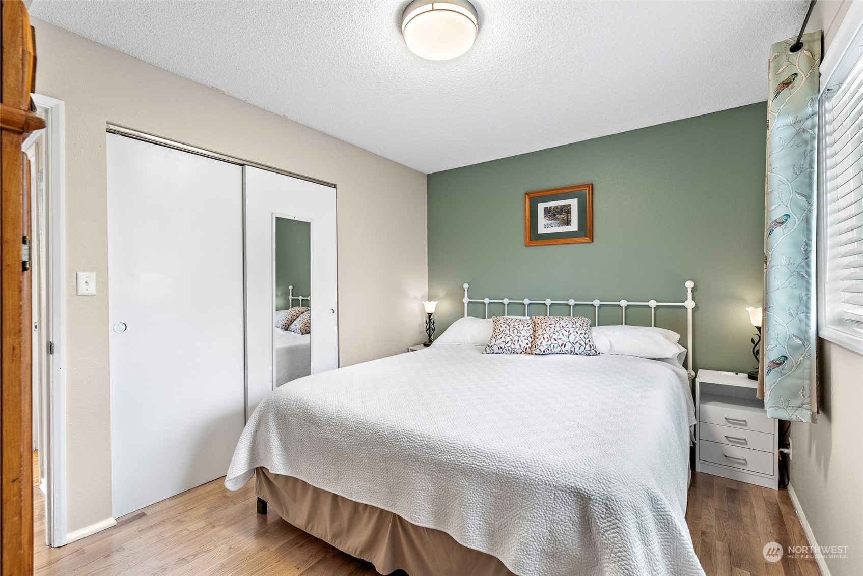 2313 Maple Lane Steilacoom, WA 98388 - Photo 20 of 40 a bedroom with a bed and a lamp