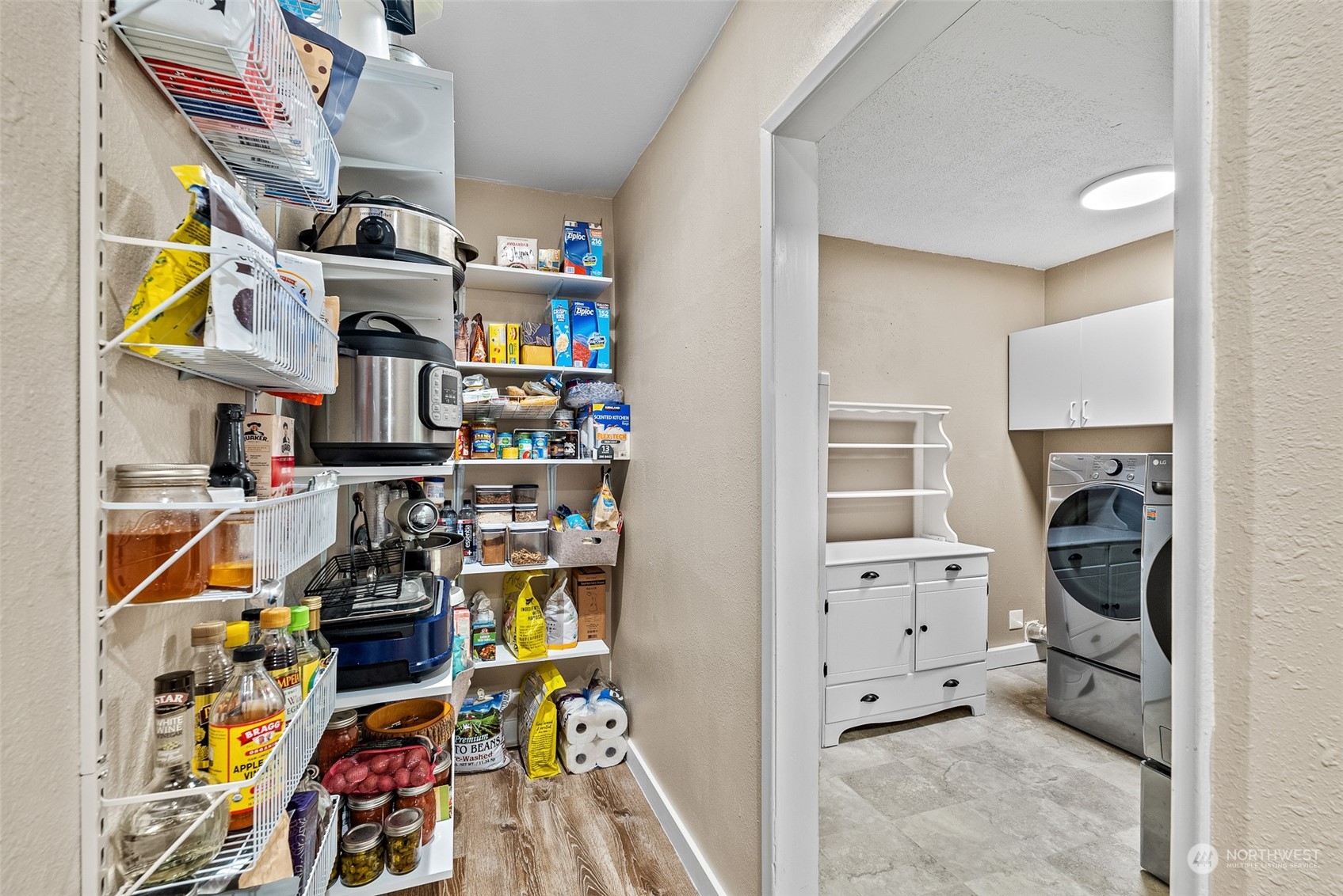 2313 Maple Lane Steilacoom, WA 98388 - Photo 26 of 40 a view of walk in closet with clothes and shoes