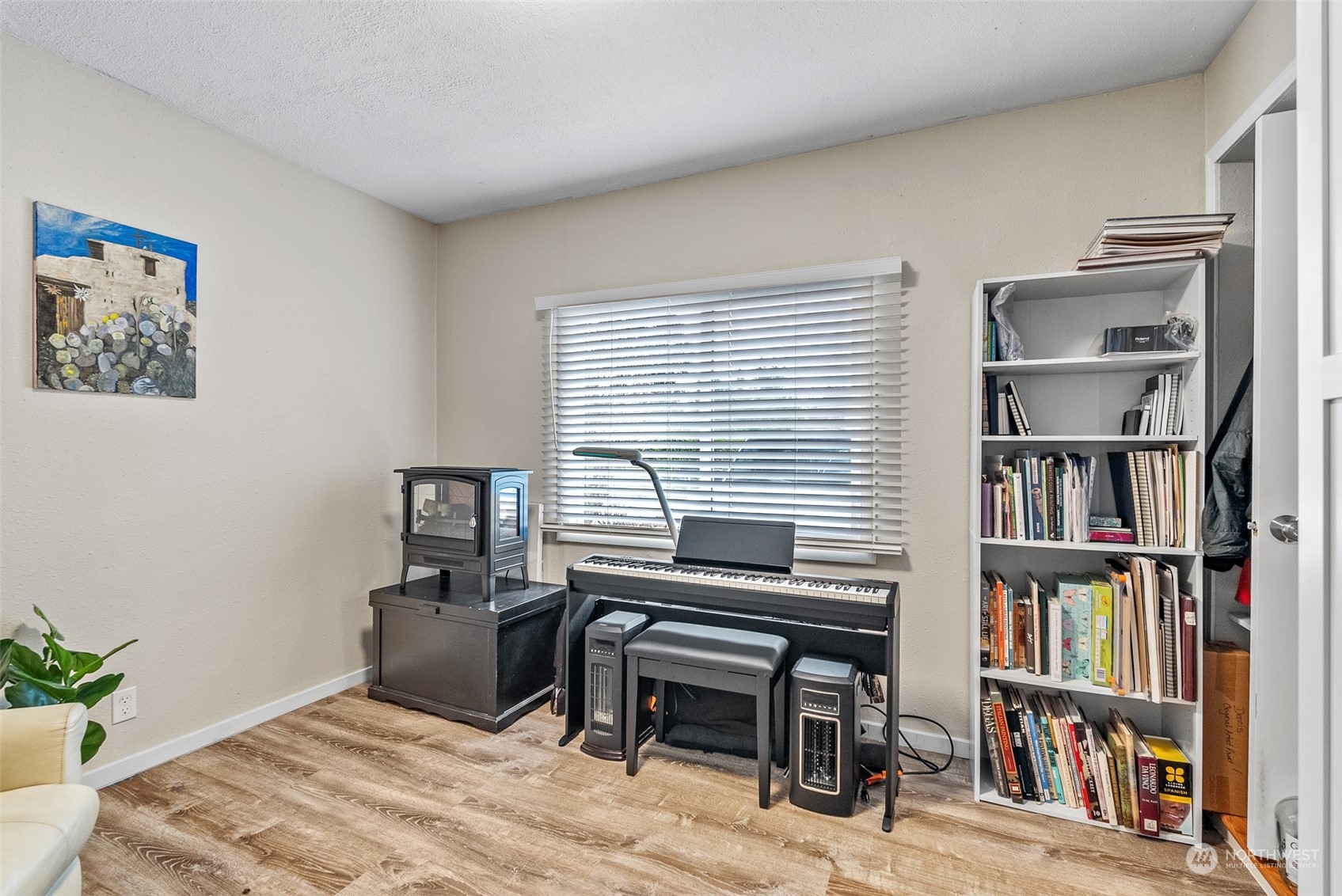 2313 Maple Lane Steilacoom, WA 98388 - Photo 30 of 40 a workspace with a bookshelf