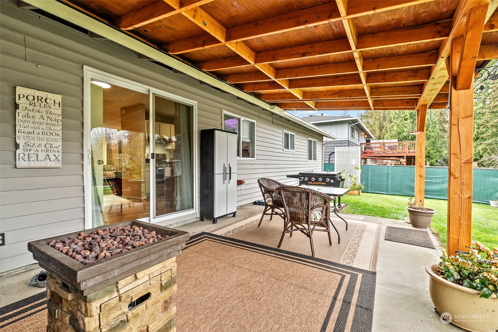 2313 Maple Lane Steilacoom, WA 98388 - Photo 31 of 40 a patio with table and chairs