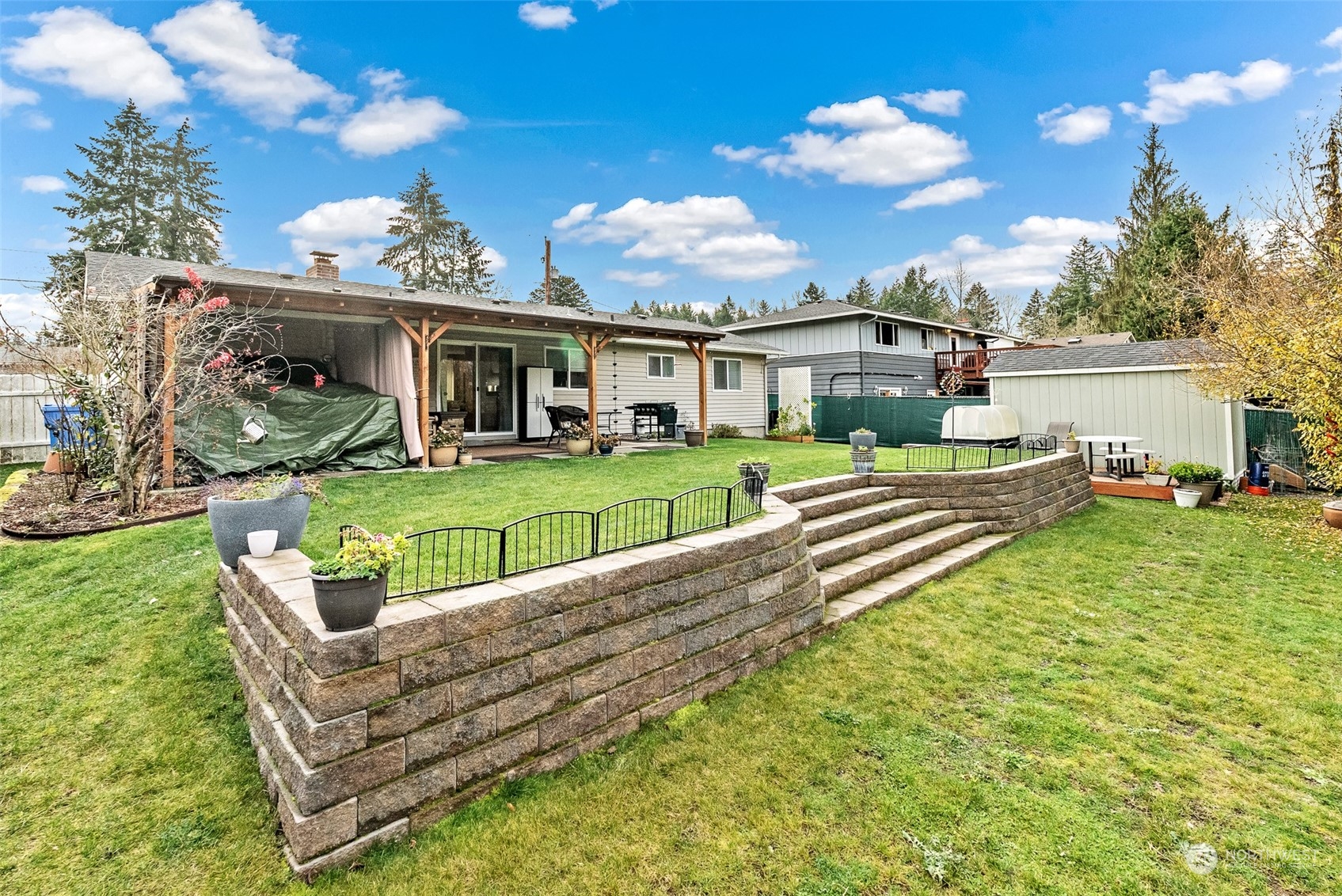 2313 Maple Lane Steilacoom, WA 98388 - Photo 32 of 40 a view of a house with a backyard