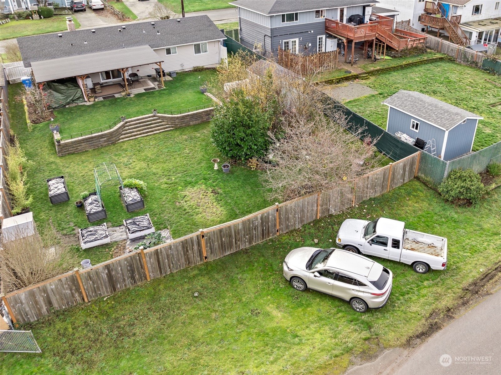 2313 Maple Lane Steilacoom, WA 98388 - Photo 36 of 40 an aerial view of a house with backyard space and garden