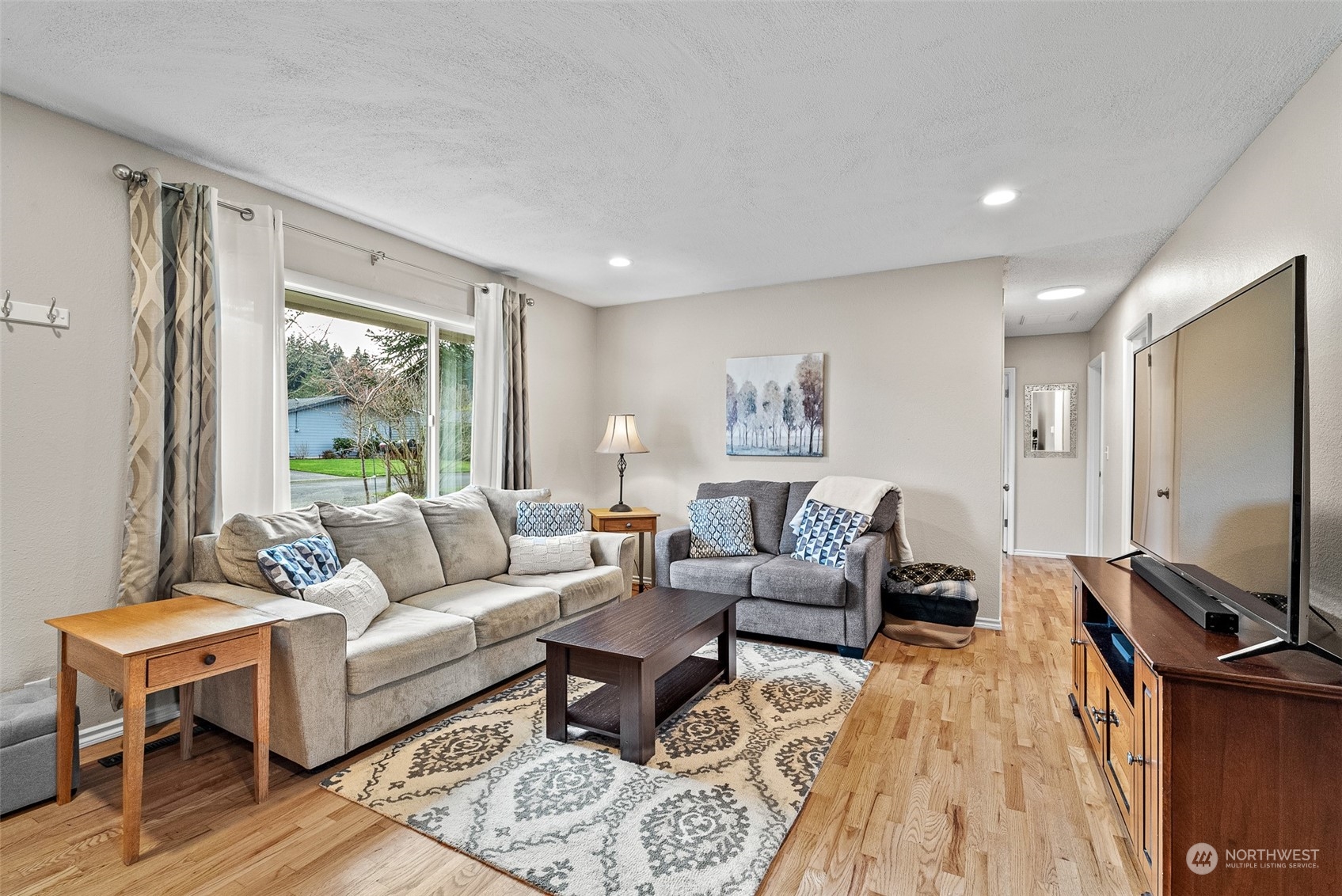 2313 Maple Lane Steilacoom, WA 98388 - Photo 6 of 40 a living room with furniture and a flat screen tv