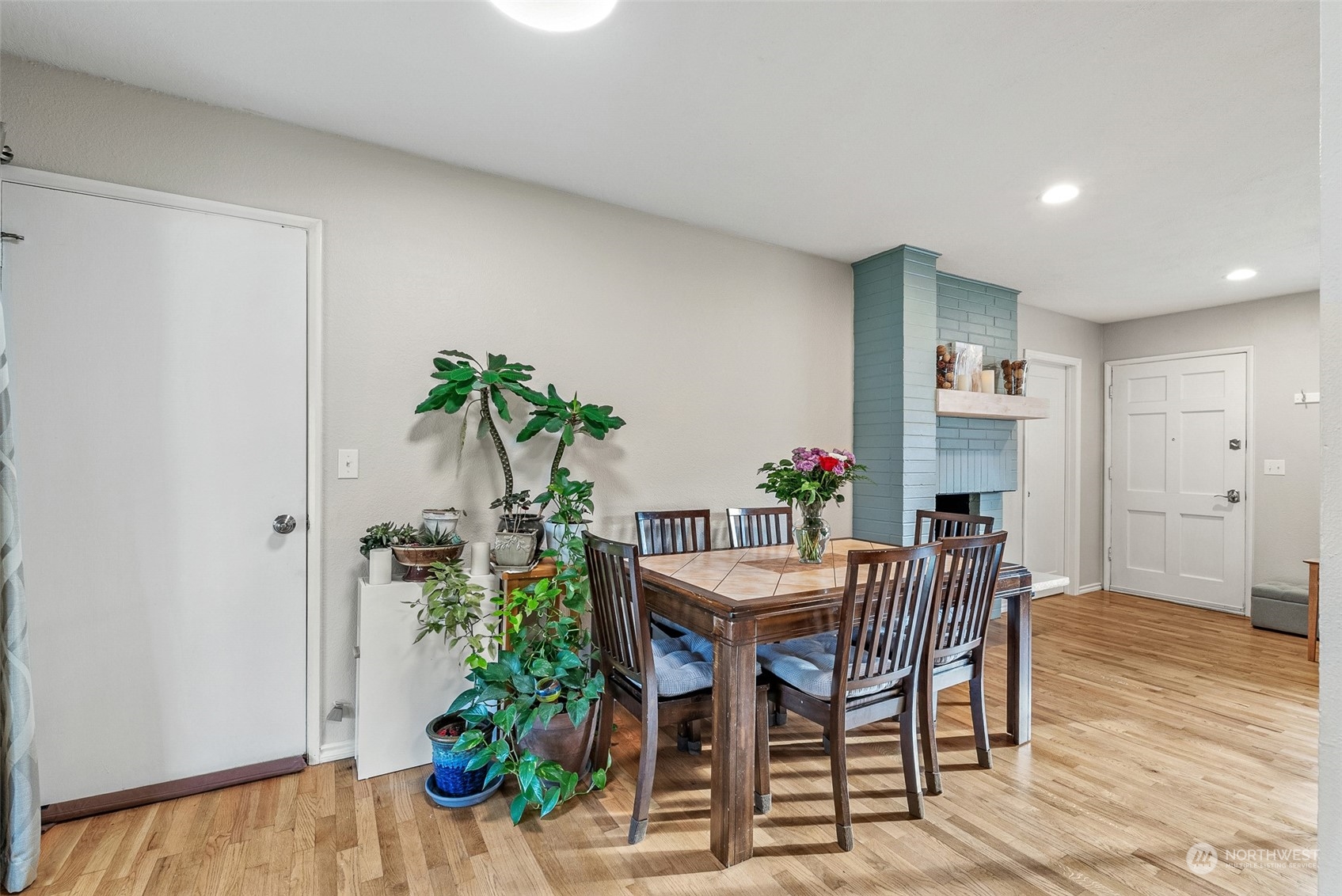 2313 Maple Lane Steilacoom, WA 98388 - Photo 9 of 40 a view of a dining room with furniture and wooden floor