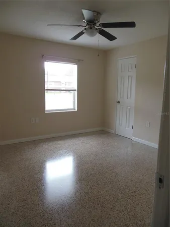 a view of empty room with windows