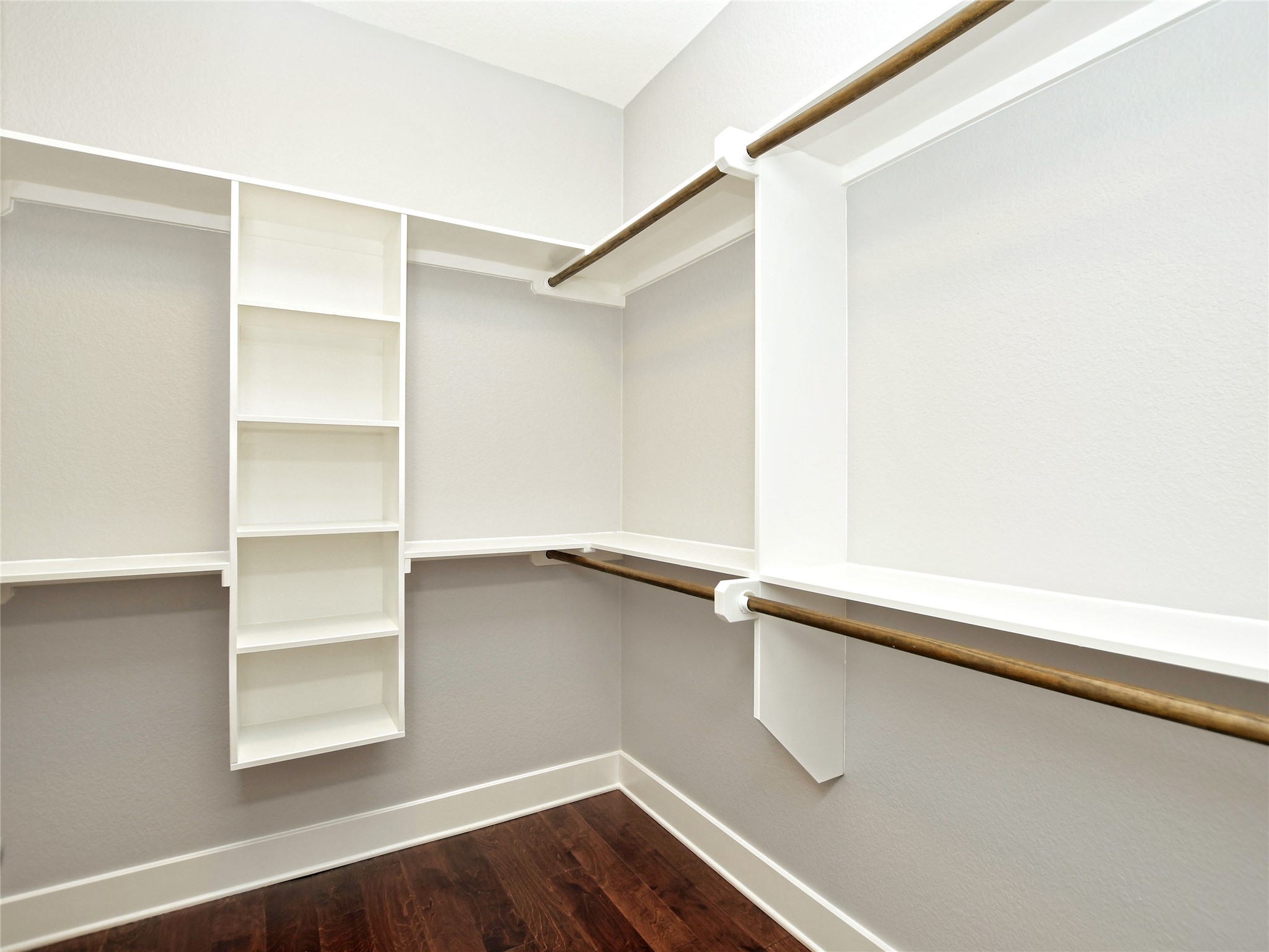 1130 Lott Avenue, Unit B Austin, TX 78721 - Photo 19 of 29 Walk in closet featuring dark wood-style floors