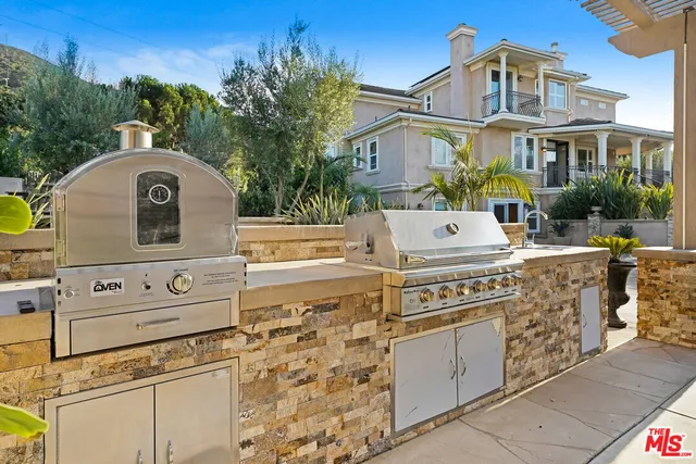 a view of a pathway with plants