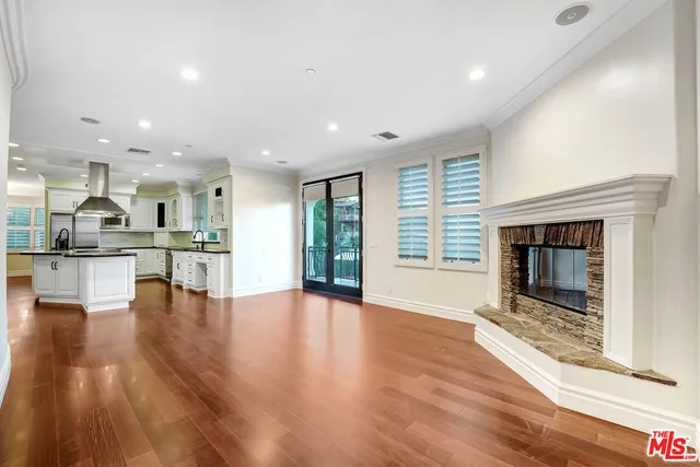 a bathroom with a sink a mirror and a toilet