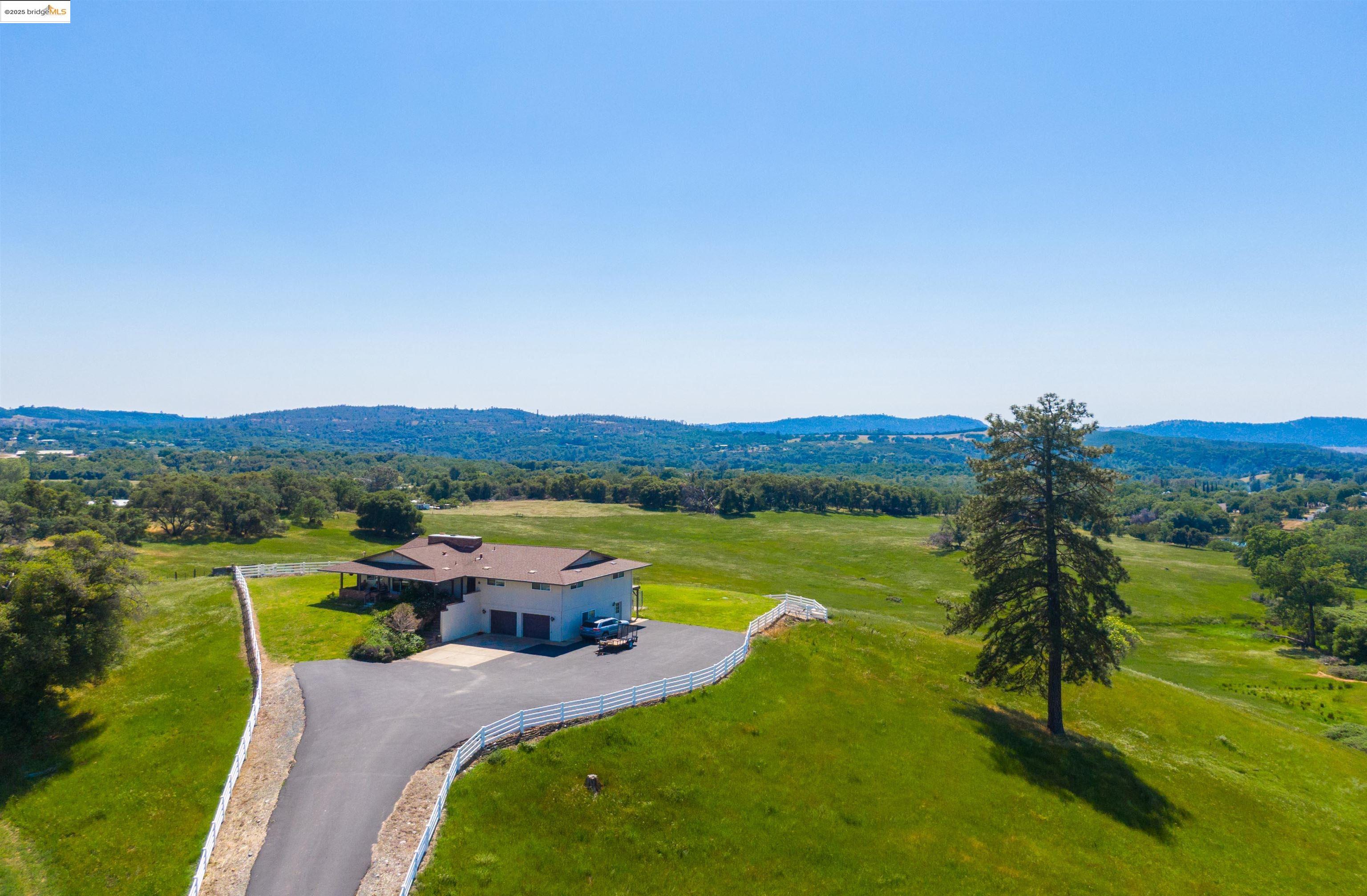 9325 Fraguero Road Sonora, CA 95370 - Photo 3 of 19 a view of lake with mountain view