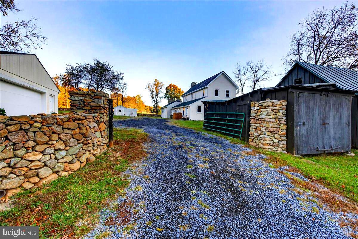 290 Riley Hollow Road Huntly, VA 22640 - Photo 115 of 148 a front view of a house with a yard and a garage