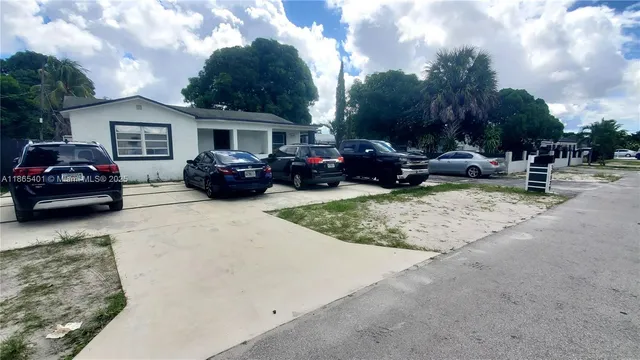 a view of a car in front of house