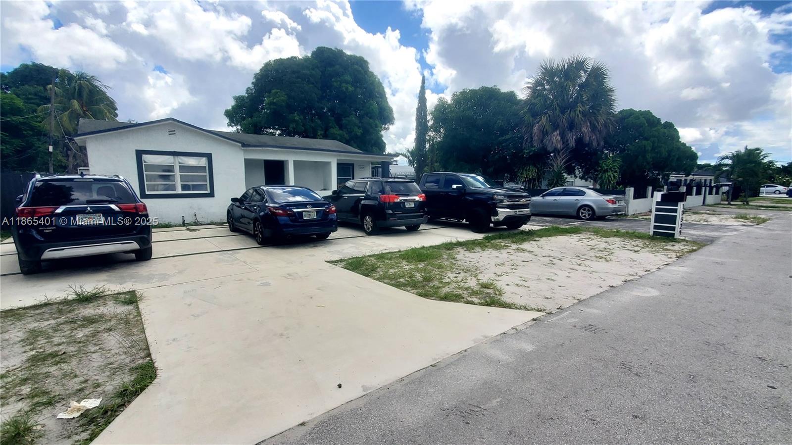 a view of a car in front of house