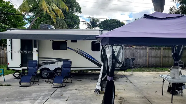 a view of house with outdoor space