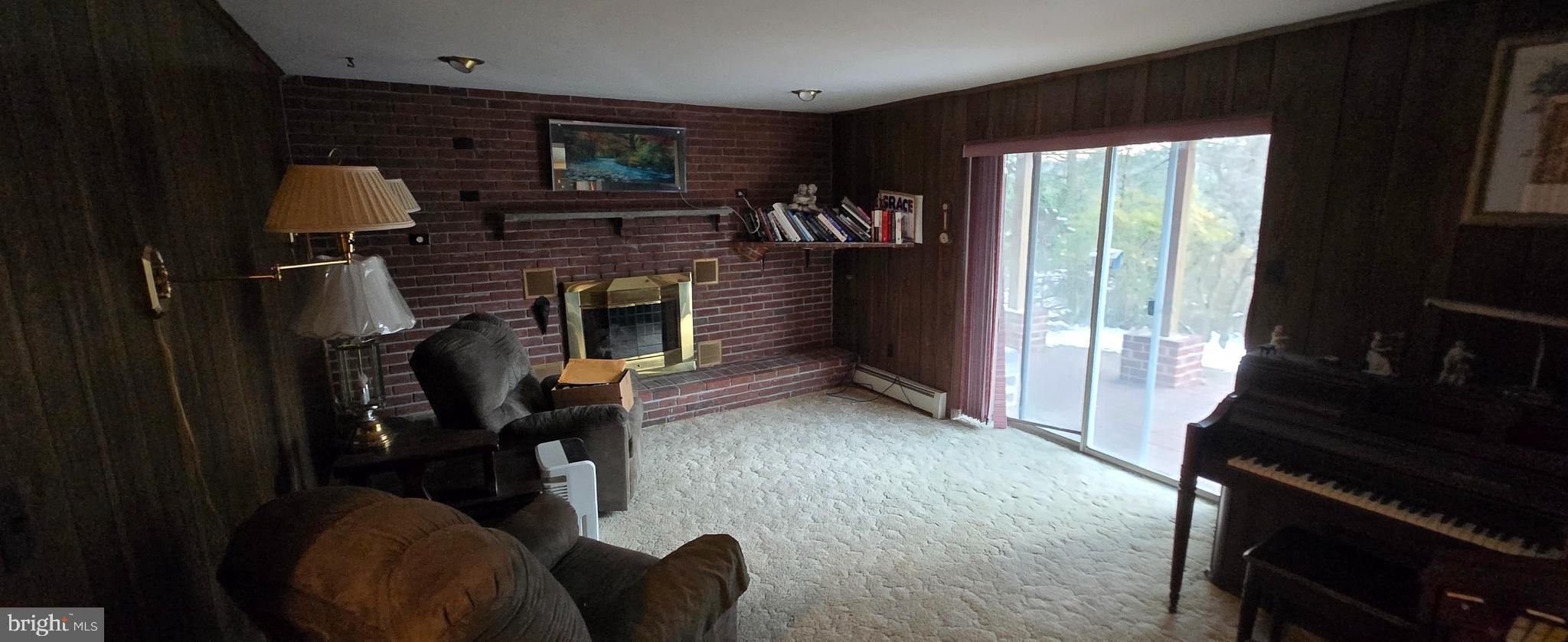 37 White Birch Road Orwigsburg, PA 17961 - Photo 18 of 26 a living room with furniture and a fireplace