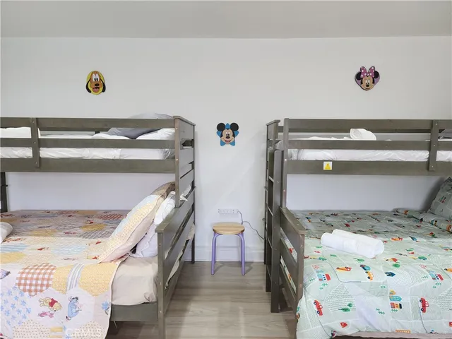 a utility room with window and washer