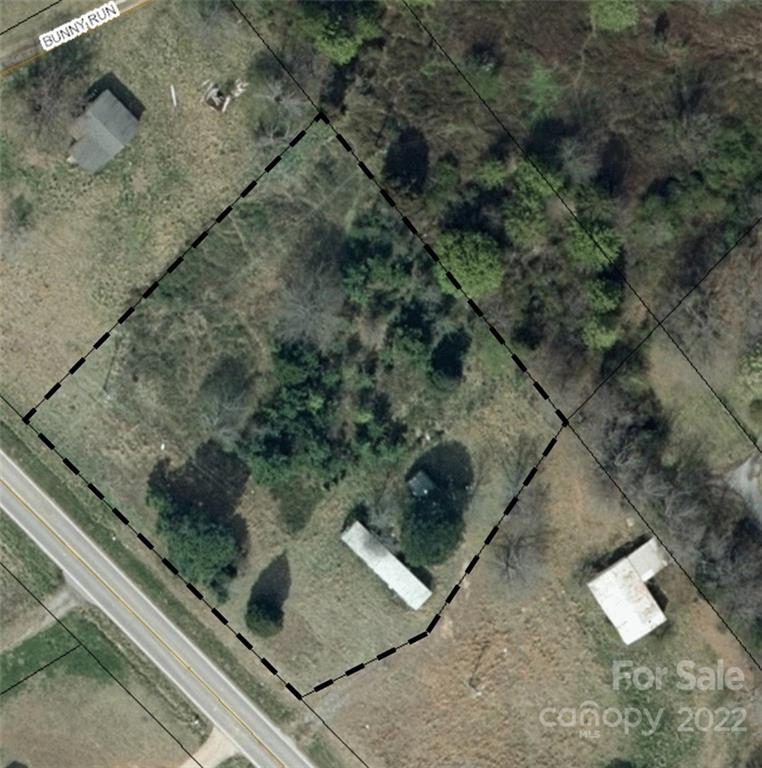 1513 Long Branch Road Grover, NC 28073 - Photo 4 of 5 a view of a tree with a yard