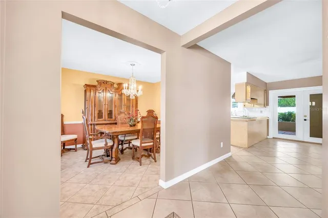 a view of a living room with furniture and a window