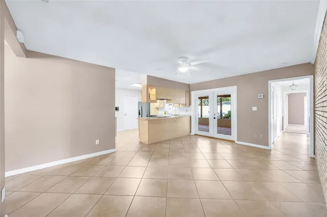 a view of a kitchen with a sink and a window