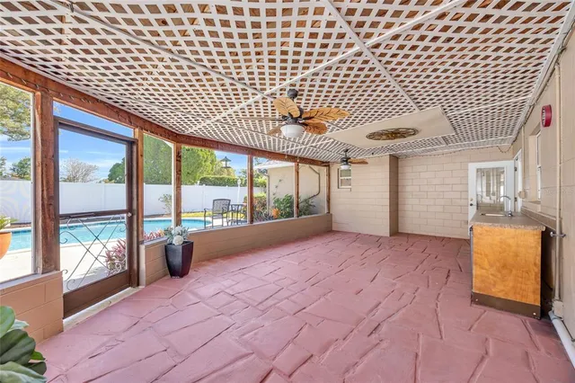 a spacious bedroom with a large window