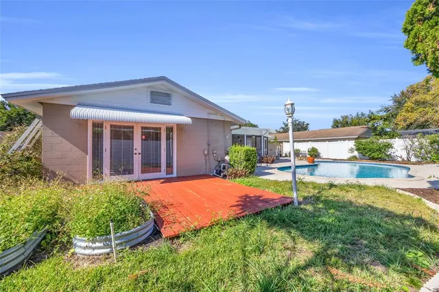 a house view with a garden space