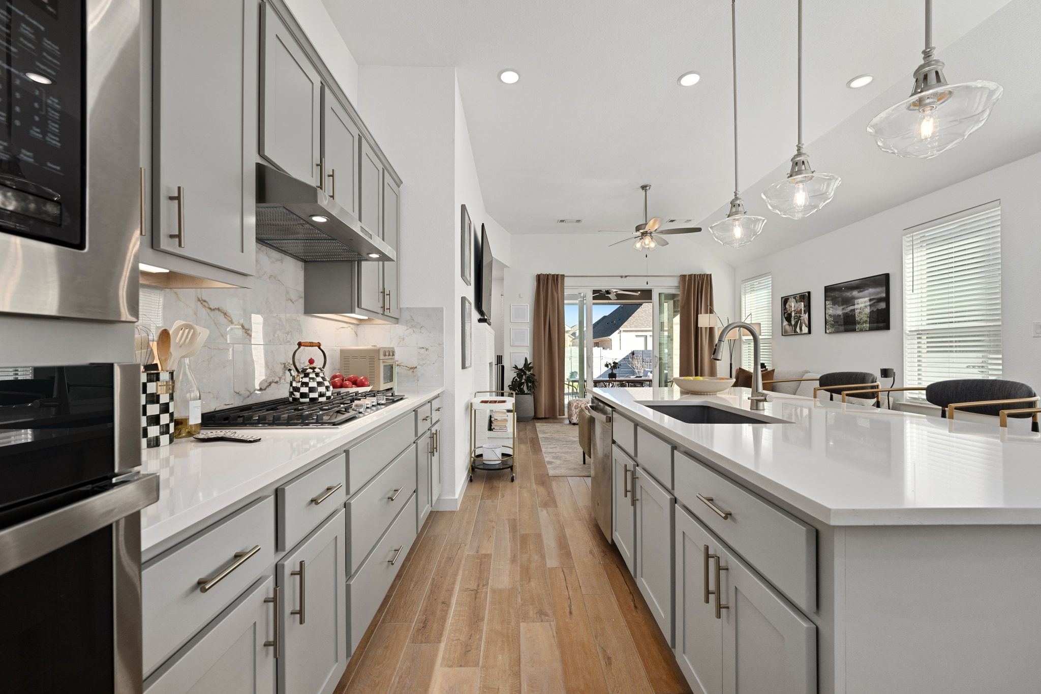 1201 Highcrest Georgetown, TX 78628 - Photo 15 of 40 The kitchen is adorned with Miami White eased-edge quartz counters.