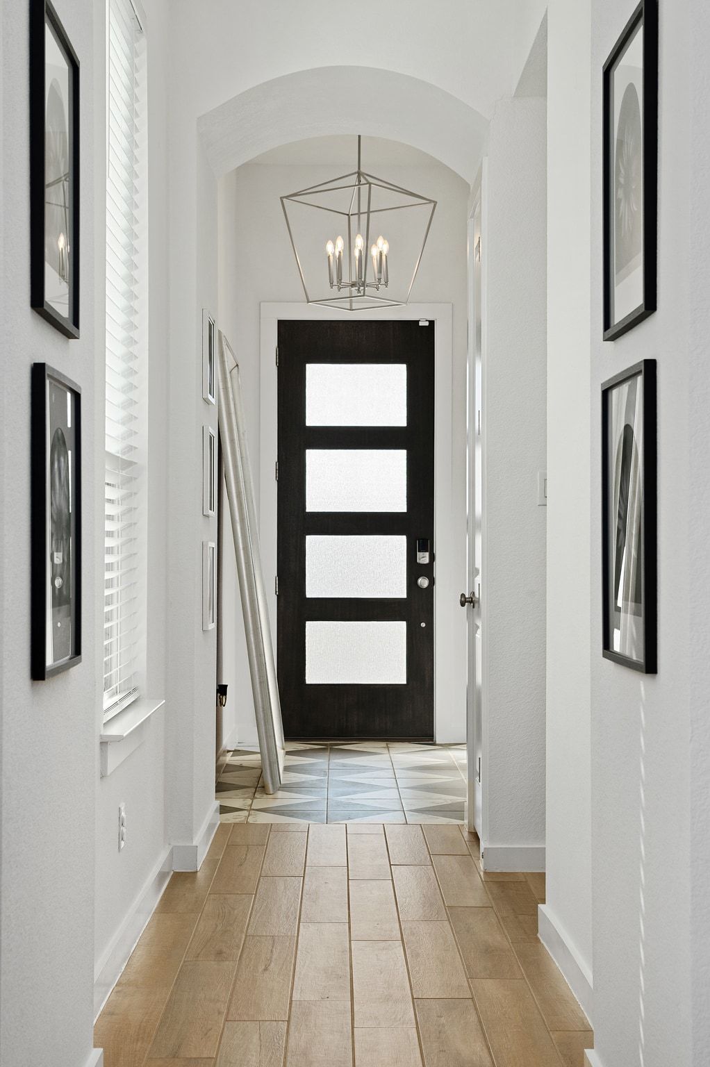 1201 Highcrest Georgetown, TX 78628 - Photo 2 of 40 The foyer gives a warm welcome with a beautiful light fixture and custom rhapsody diagonal tile.