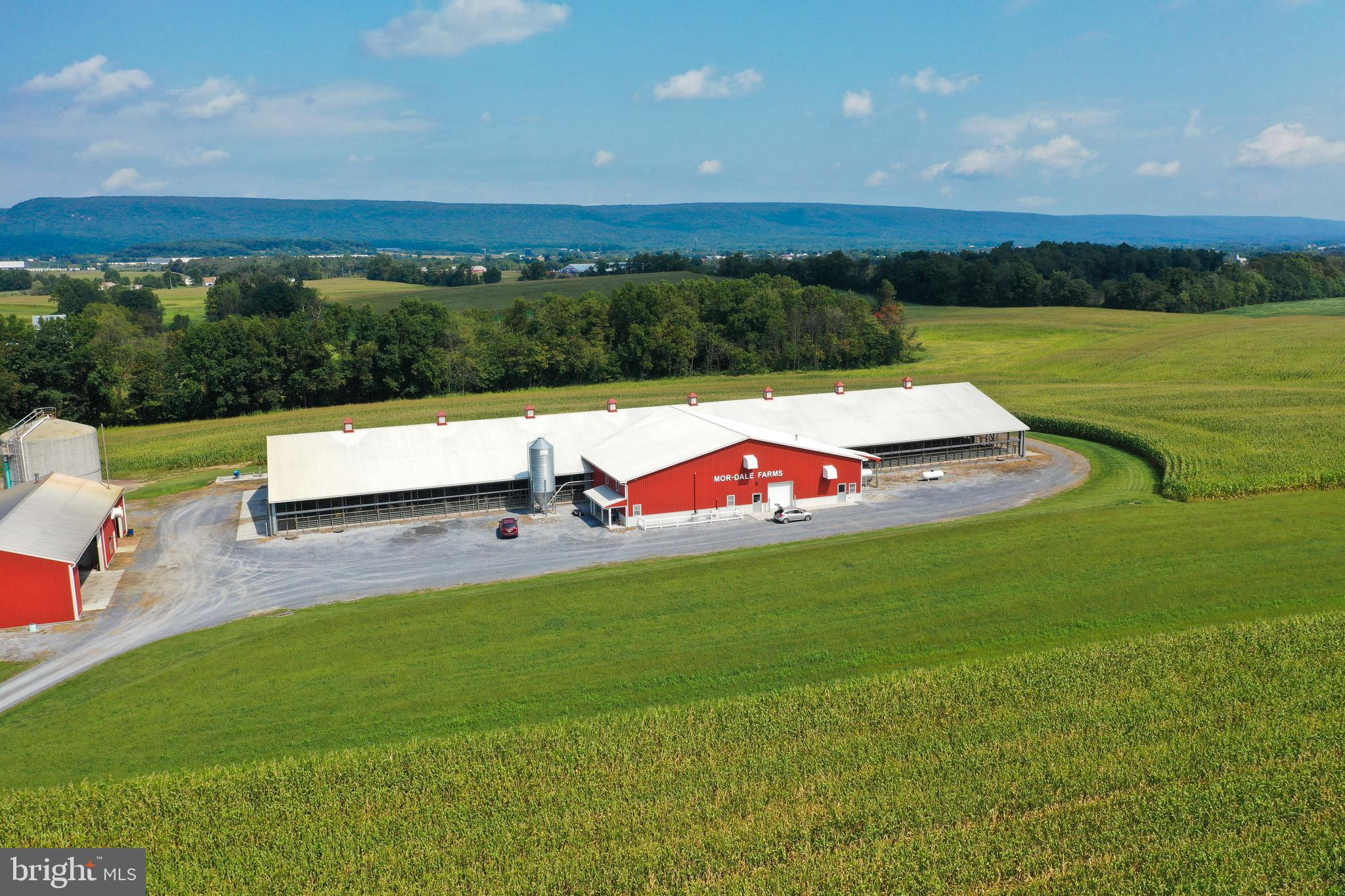 230 School Road Bethel, PA 19507 - Photo 4 of 12 a view of a green field with an ocean view