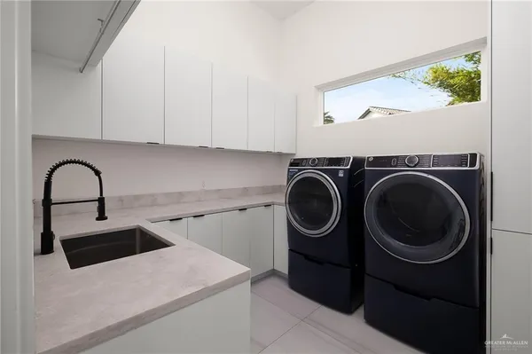 a bathroom with a granite countertop sink a toilet and a mirror